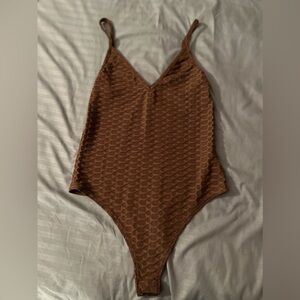brown bodysuit